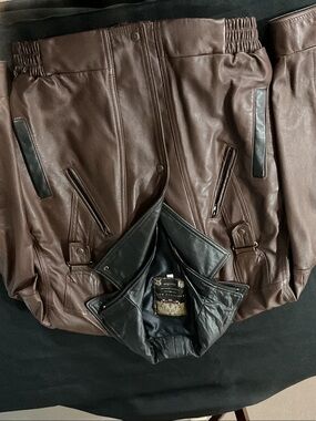 Classic Women's Brown Faux Leather Jacket with Black Trim
